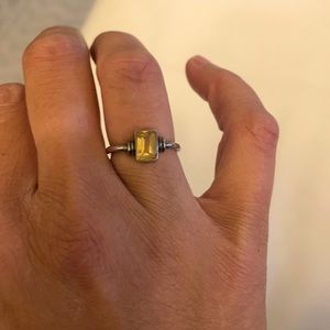 Sterling silver ring with yellow light tint orange stone